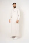 C-XC-155-Compassion-1-alqamees-white-thobe-1.webp