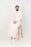 C-XC-155-Compassion-1-alqamees-white-thobe-1.webp