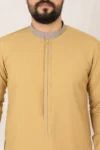 C-XC-160-Guard-1-alqamees-Mustard-thobe-1.webp