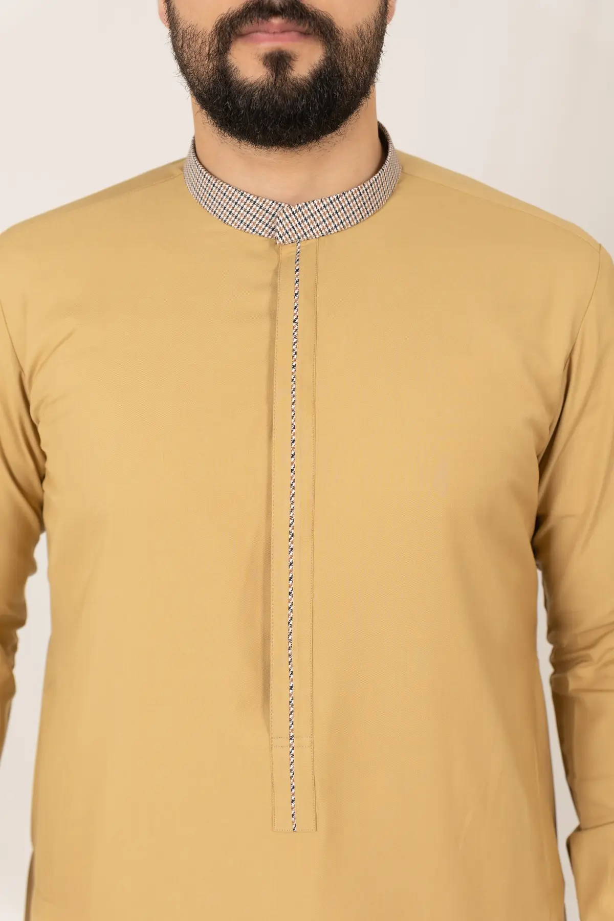 C-XC-160-Guard-3-alqamees-Mustard-thobe-1.webp