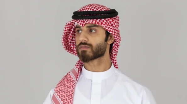 traditional red and white shemagh worn with white thobe