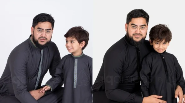 father and son wearing matching thobes
