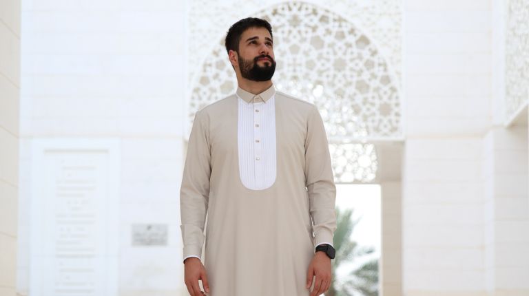 elegant Eid outfit for men featuring white thobe