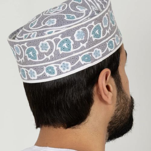 embroidered Omani kufi with traditional leaf pattern