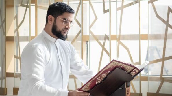 man in thobe in mosque