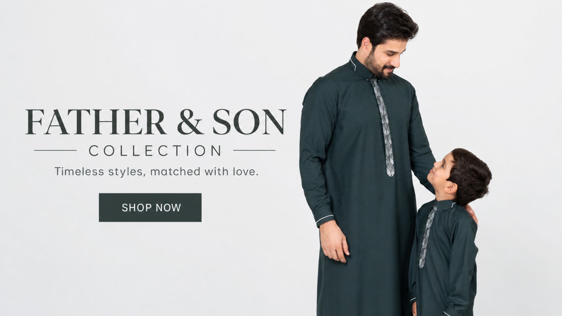 Father and son in matching dark green traditional outfits, looking at each other in a light studio (fashion collection banner)