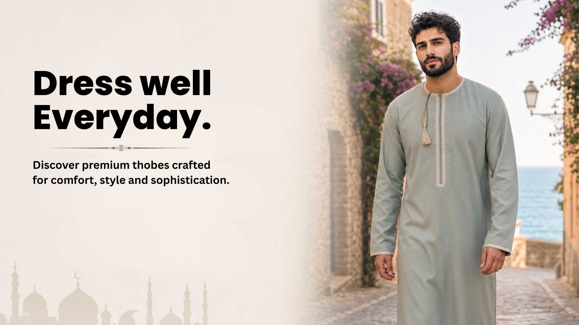 Hero banner promoting premium thobes: man in a light gray thobe beside a coastal street, with bold text 'Dress well Everyday.'