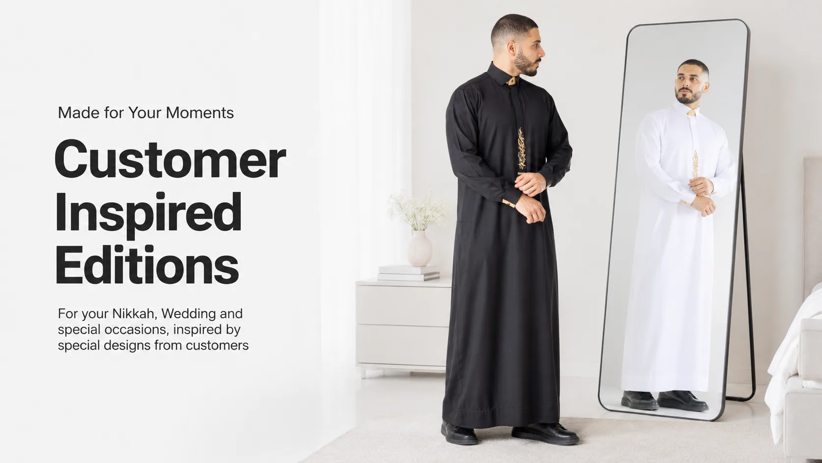 Man in a black thobe stands in a bright room, looking at his reflection in a full‑length mirror beside a dresser; left-side copy reads 'Customer Inspired Editions'.