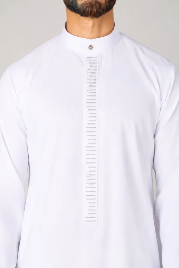 Man wearing a white kurta with a high mandarin collar and a vertical stitched placket down the chest.